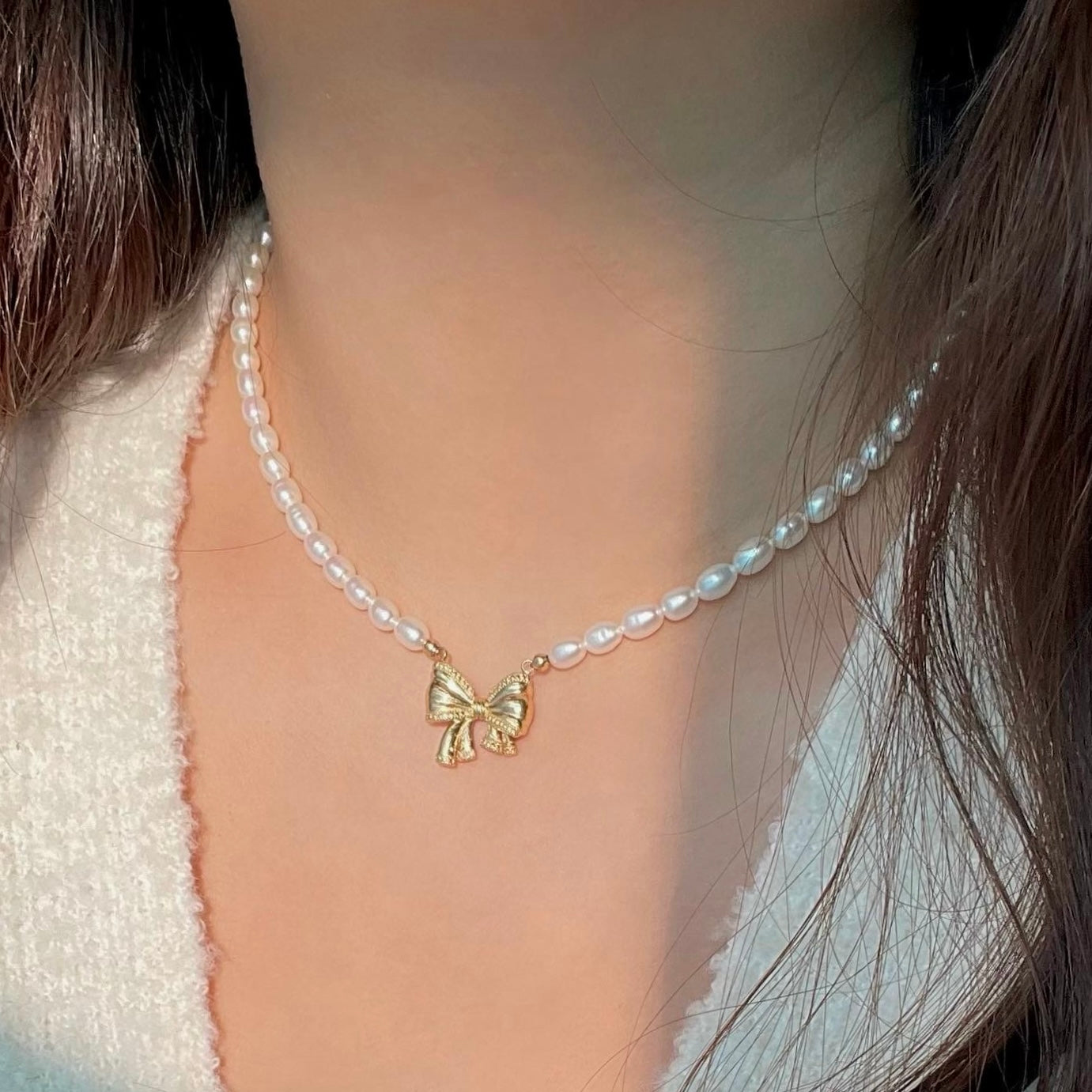 Collana perla con ciondolo Fiocco