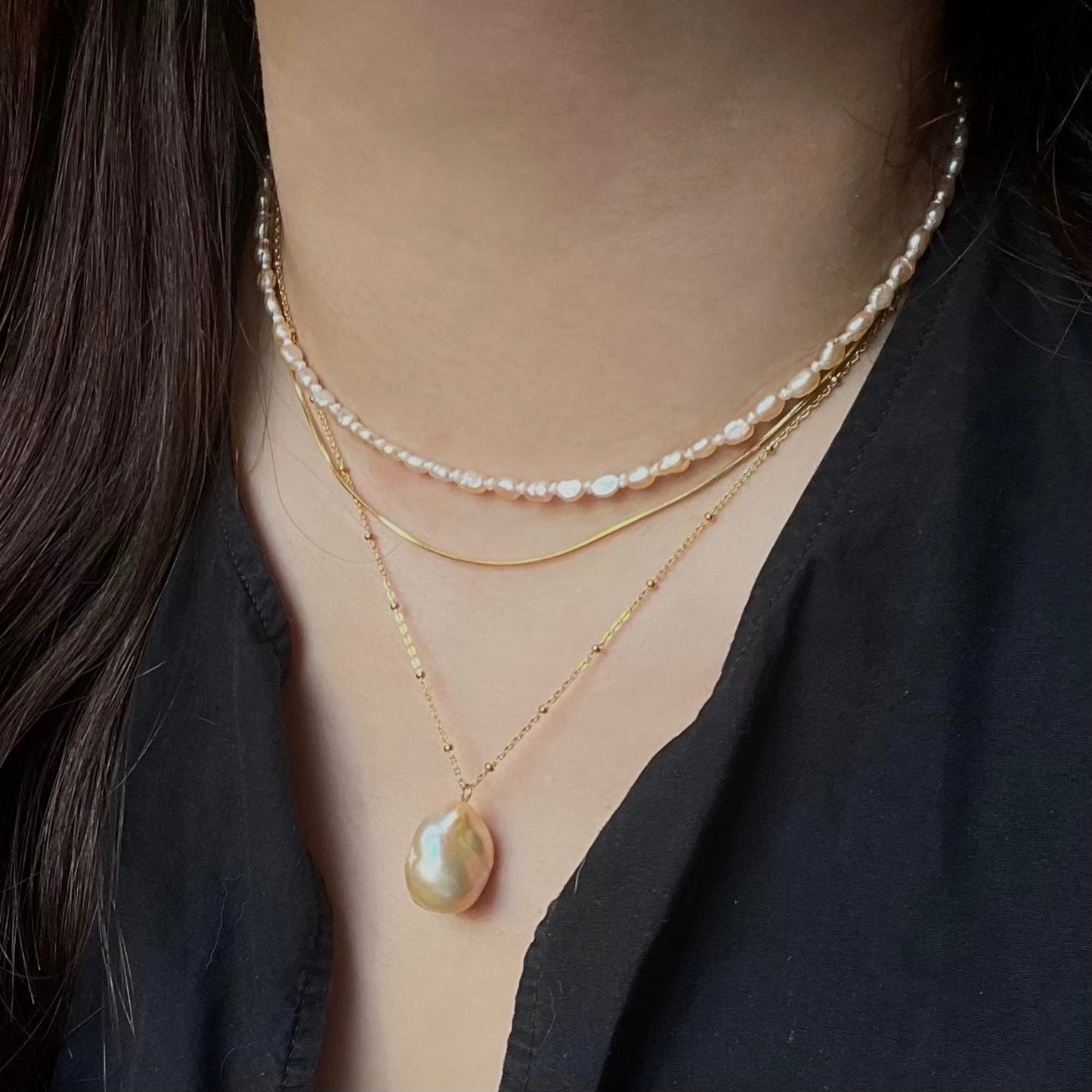 Girocollo con mini perle arancione e bianco