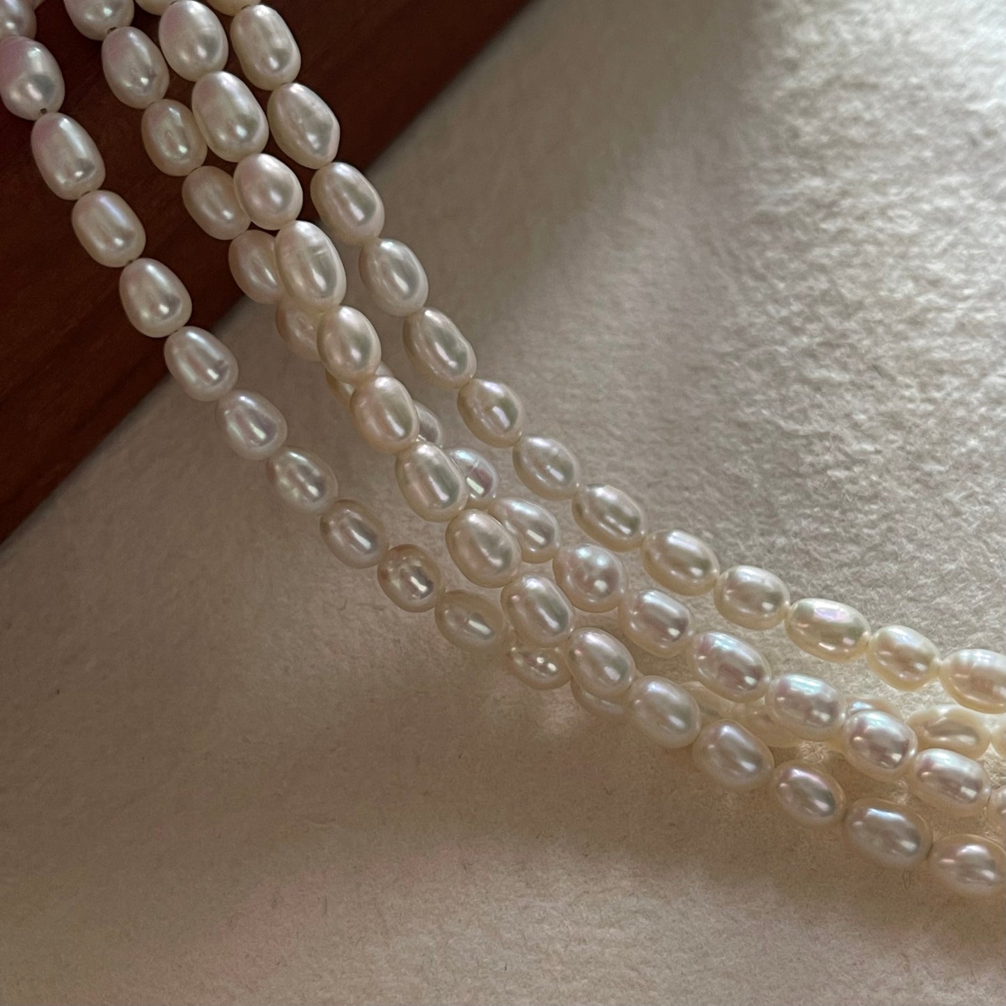 Collana perla con ciondolo Fiocco