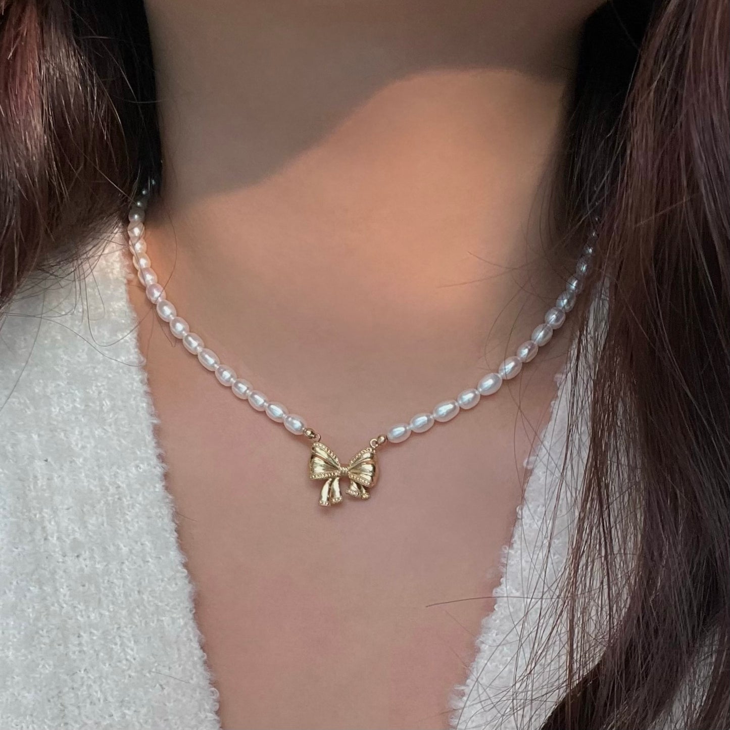 Collana perla con ciondolo Fiocco