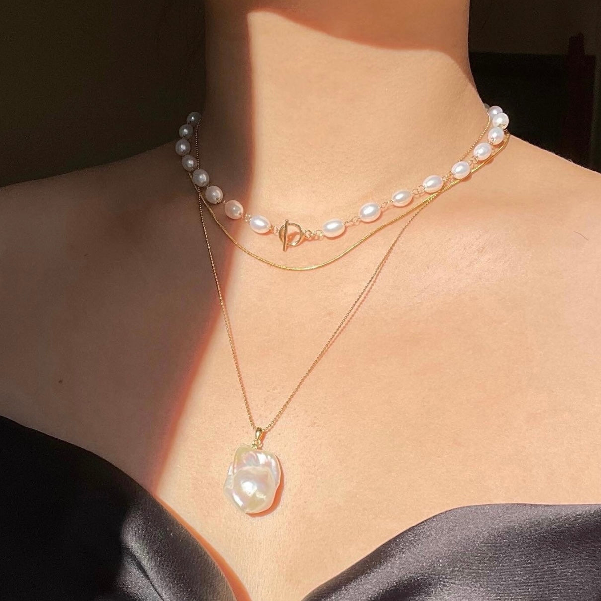 Collana perle con chiusura a T