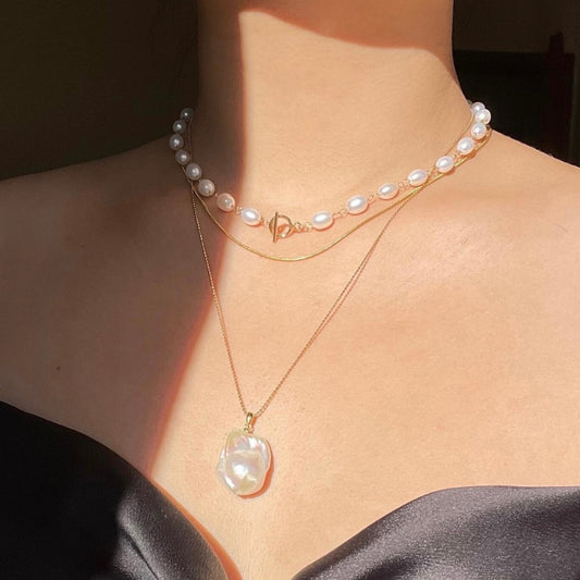 Collana perle con chiusura a T