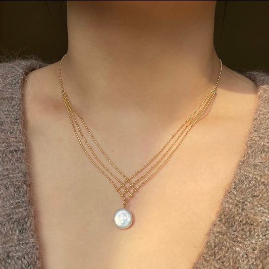 Collana con ciondolo perla a bottone