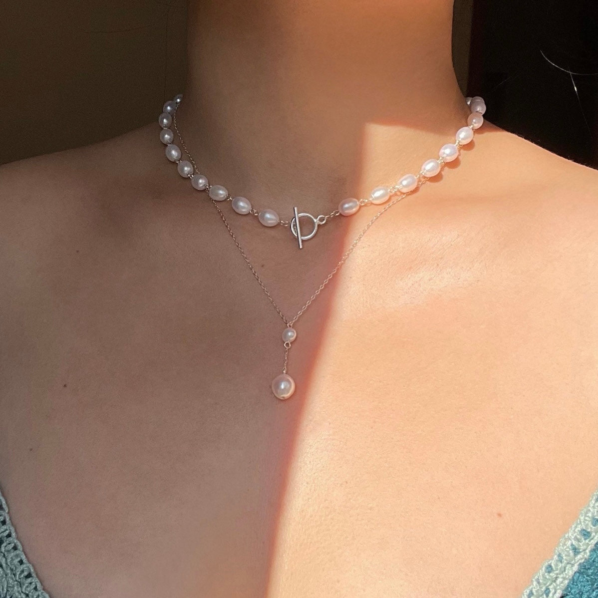 Collana perle con chiusura a T