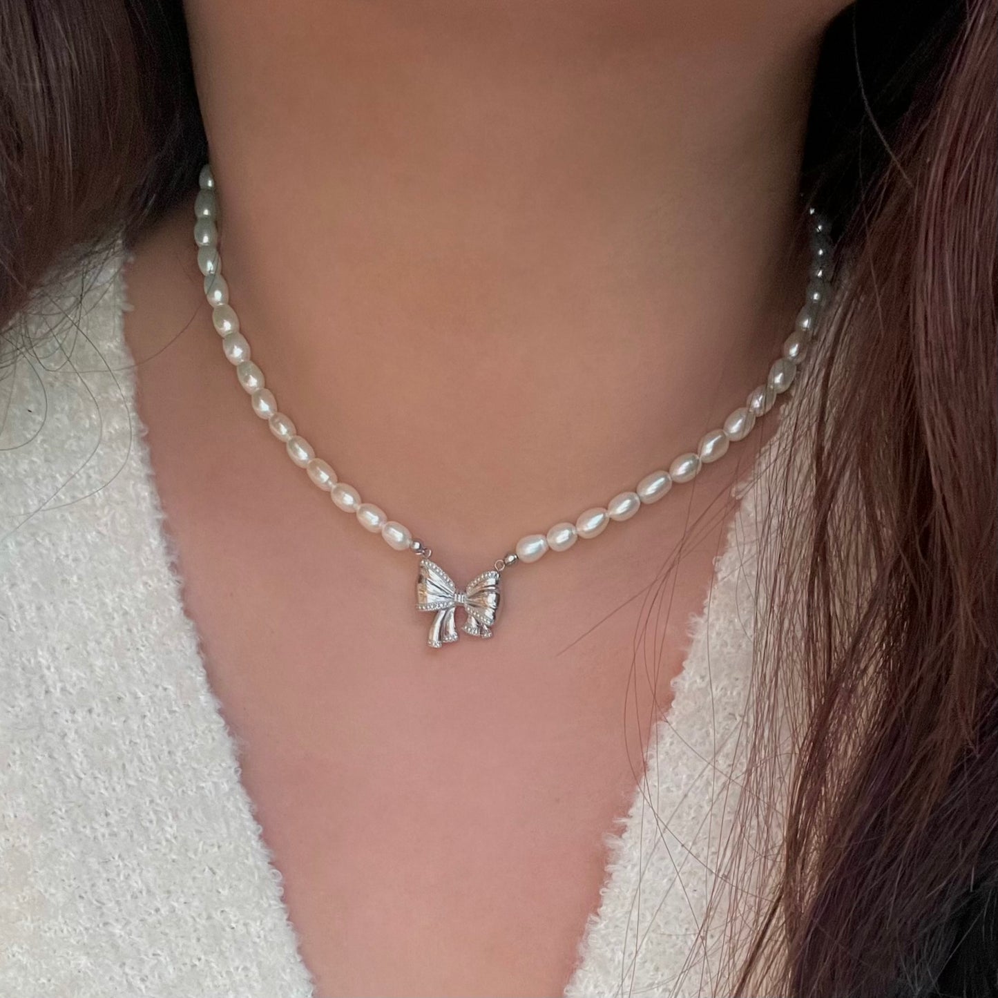 Collana perla con ciondolo Fiocco