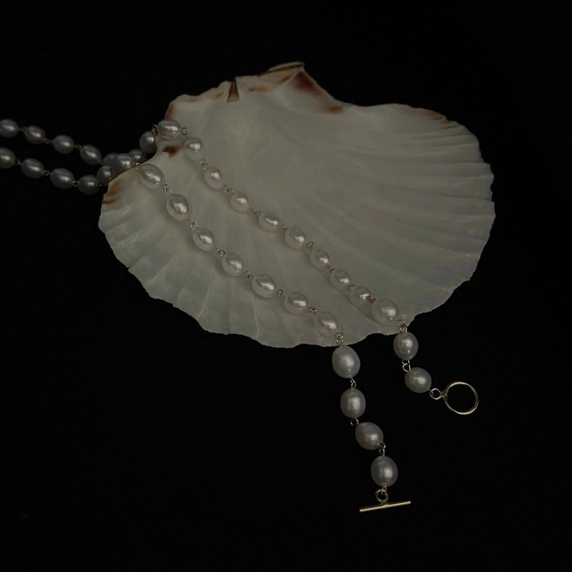 Collana perle con chiusura a T