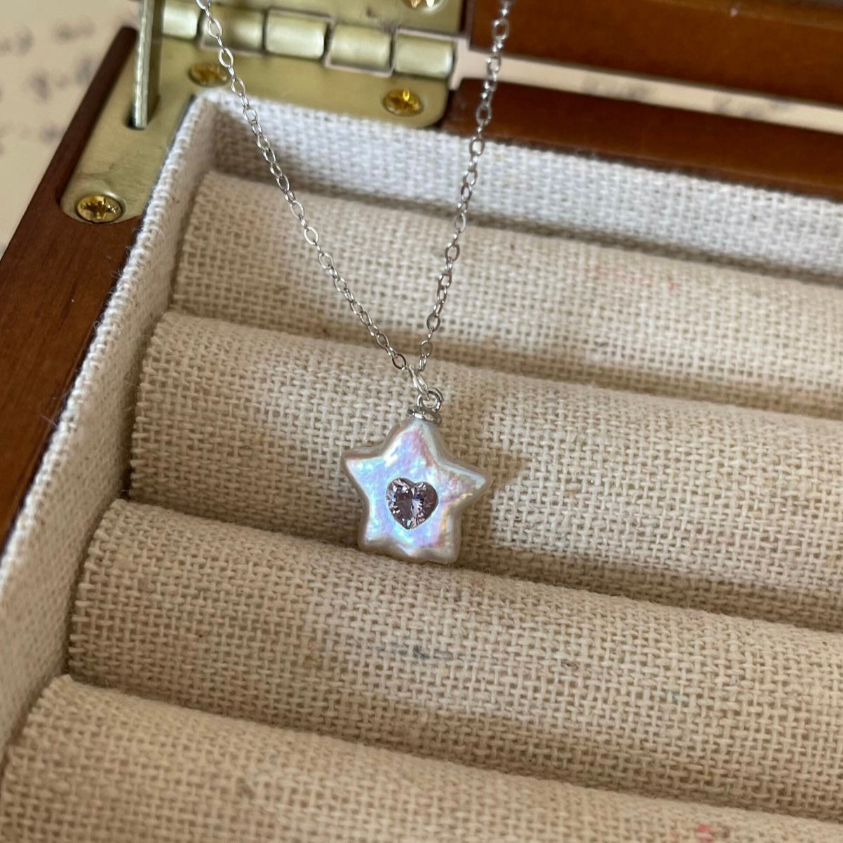 Collana Stella con zircone a cuore