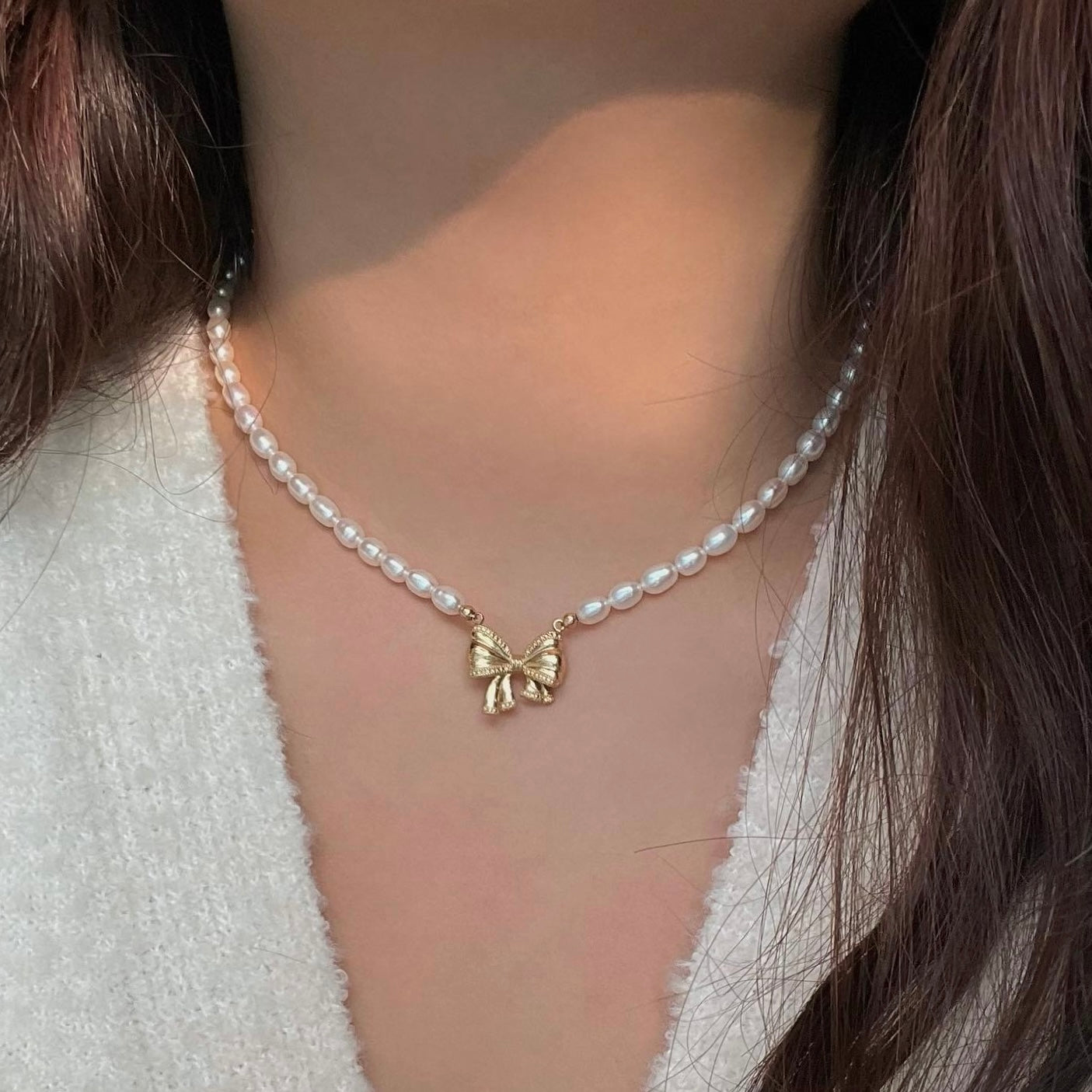 Collana perla con ciondolo Fiocco