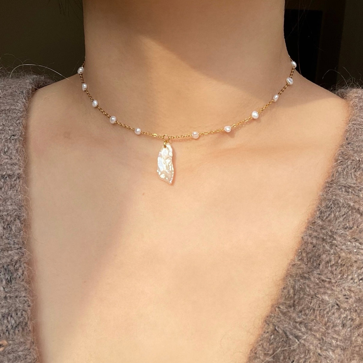 Choker con ciondolo perla